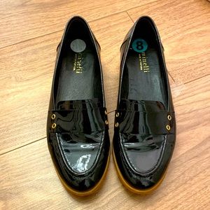 Shiny black formal shoes